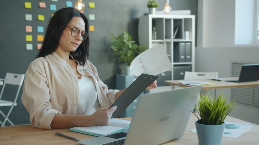 An employer reviewing a document